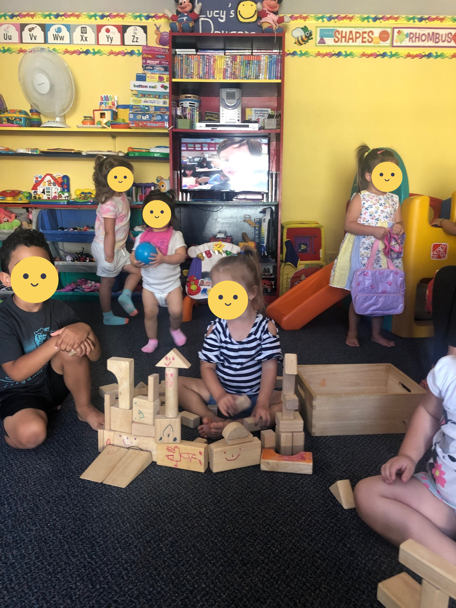 Children playing with building blocks.